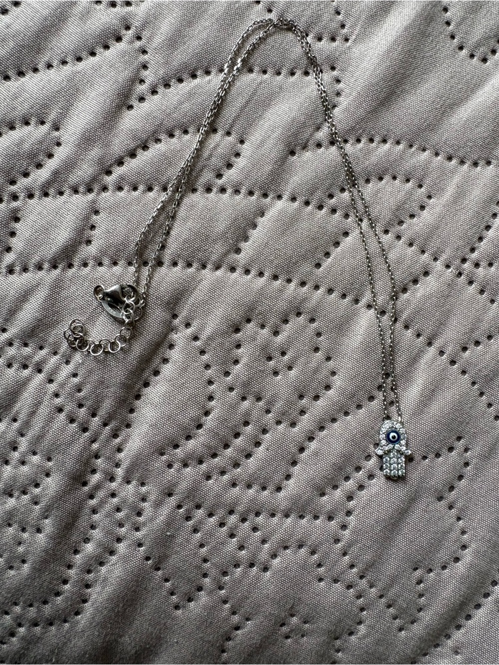 Silver Hamsa Hand Necklace with Blue Evil Eye Accent